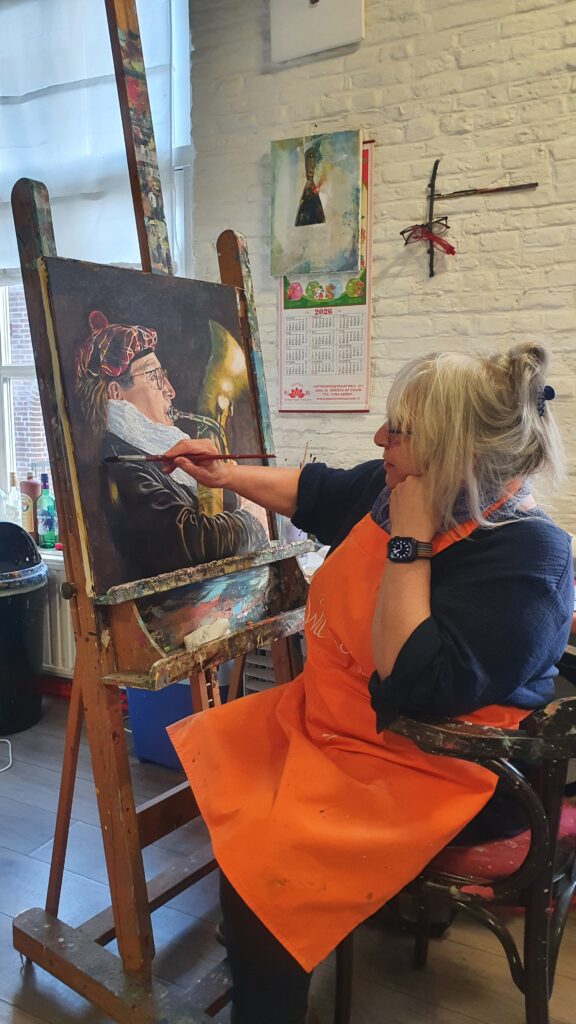 Kunstenaar schildert op een ezel - Bergen op Zoom